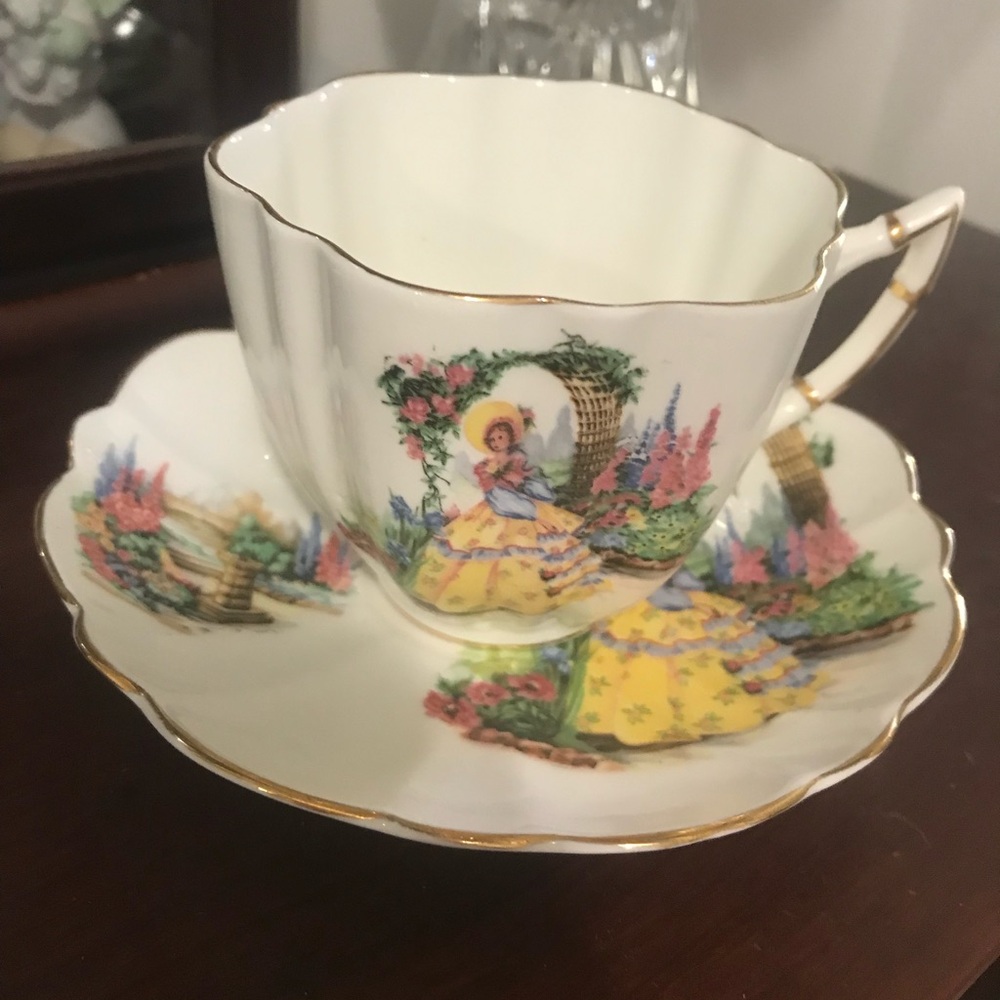 Vintage Victoria fine bone china teacup and saucer with southern belle design